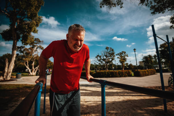 istock Senior man doing push ups on sunny summer day in Florida 1168122821
