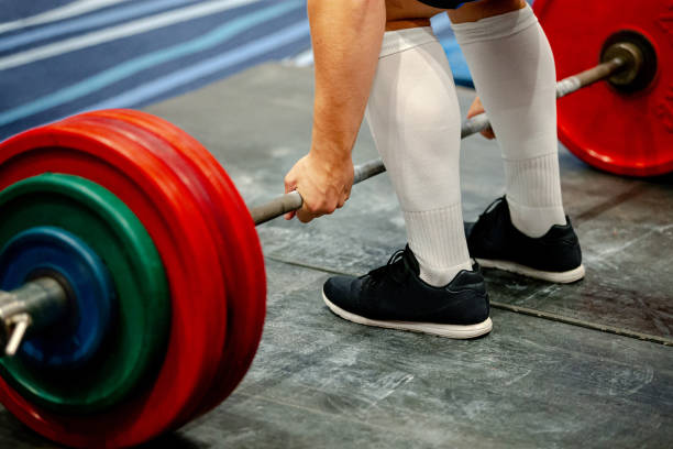 istock men powerlifter weightlift bar 1168123536
