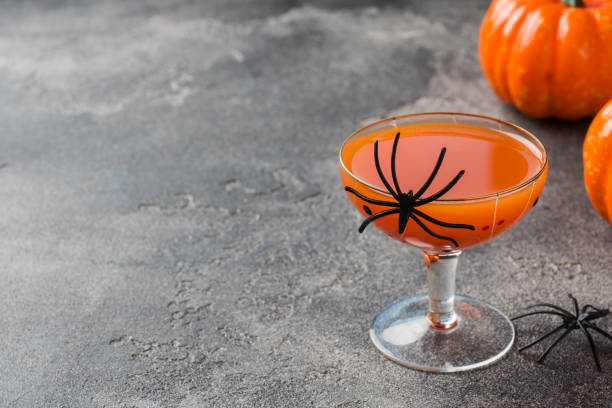 istock Fresh pumpkin juice. Concept Halloween celebration. Background of spider web. 1168124669