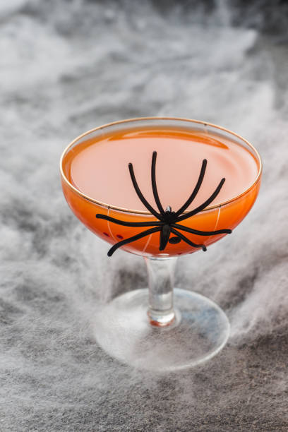 istock Fresh pumpkin juice. Concept Halloween celebration. Background of spider web. 1168124924