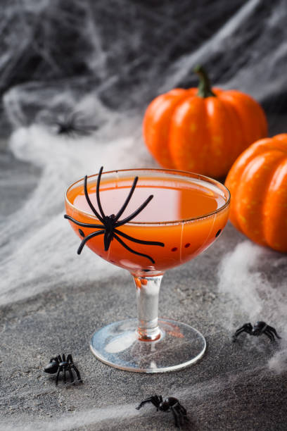istock Fresh pumpkin juice. Concept Halloween celebration. Background of spider web. 1168126130