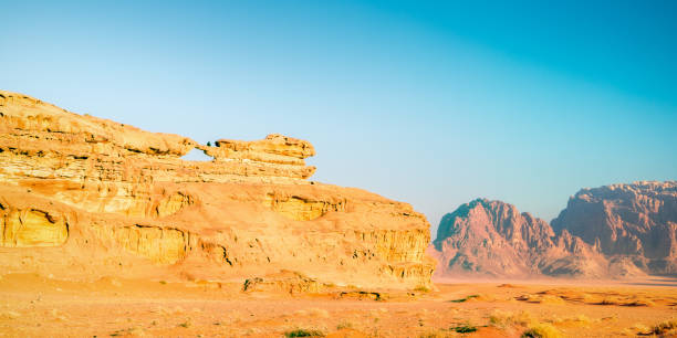 istock Wadi Rum - Little Arch by Morning Golden Hour 1168130455