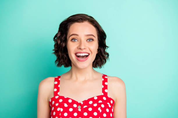 istock Close up portrait of overjoyed rejoicing gorgeous funny funky charming girlfriend who cannot help admiring handsome guy passing by her while isolated with teal background 1168130619