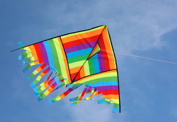 istock kite with colors of rainbow on the blue sky 1168132488