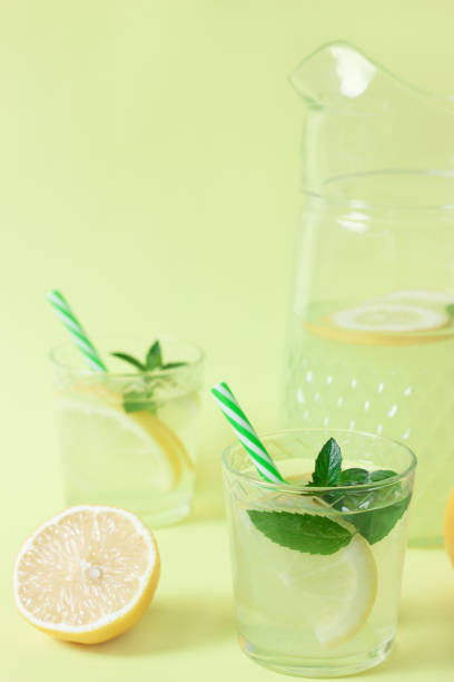 istock Lemonade or mojito cocktail with lemon and mint 1168133371