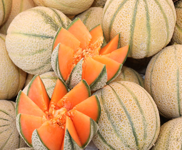 istock Opened Melons at market 1168135316