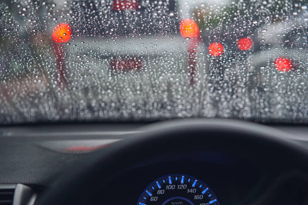 istock Traffic jam with rainy weather view from inside car. 1168135557