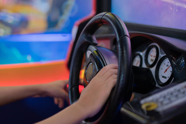 istock Happy Boy PlayingCar Racing Video Game 1168138149