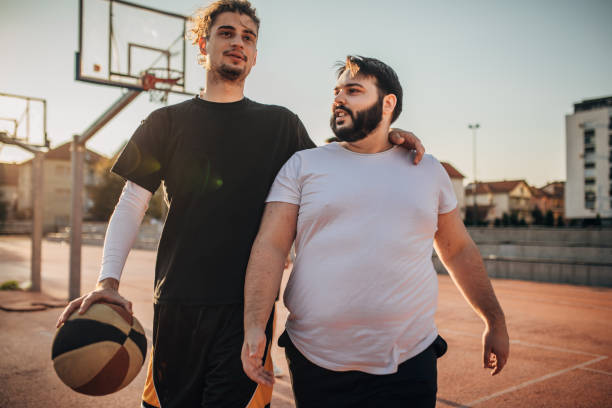 istock Two basketball friends 1168140854