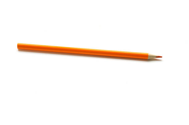 istock Orange color pencil on white background. - Image 1168142406