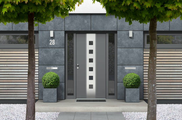 istock modern real estate bungalow home facade with front door, yard and trees 1168143089