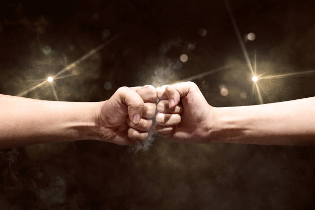 istock Hands of two men bumped their fists 1168147145