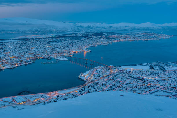 istock Sunset over Tromso, Norway during winter 1168148035