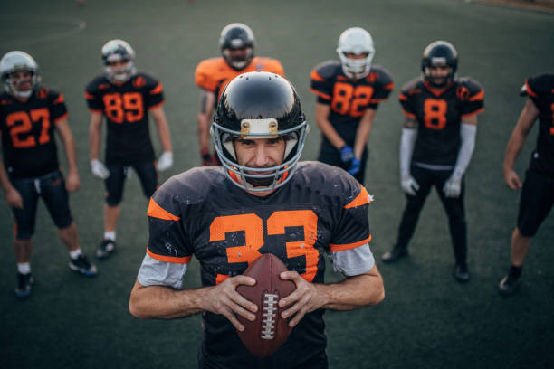 istock Group of Football players on practice 1168149010