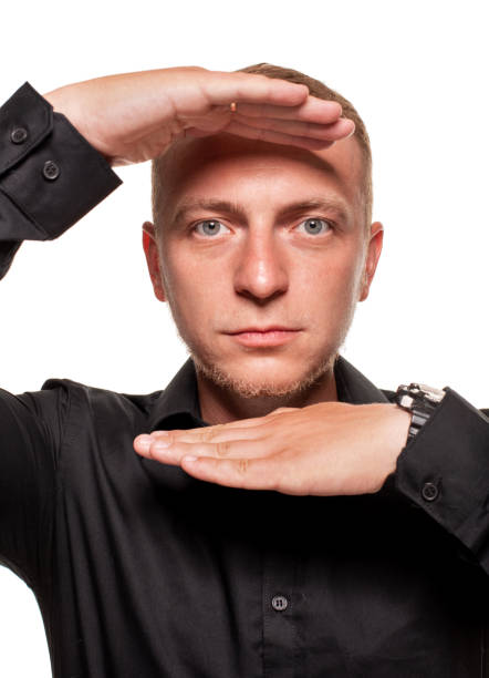 istock Handsome young blond man in a black shirt, isolated on a white background 1168151128