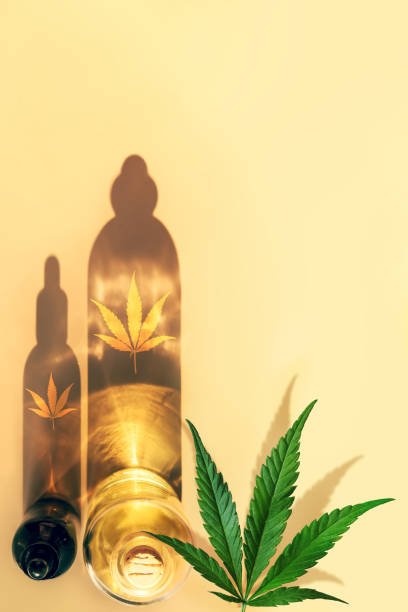 trendy sunlight and shadows from cbd oil bottles on light background. top view. creative composition, minimalism concept - narcotic medicine pill insomnia imagens e fotografias de stock