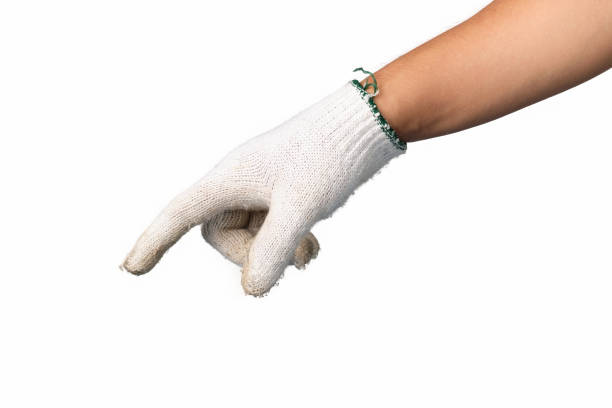 istock Human hand is wearing mechanic gloves showing gesture push button on isolated background. 1168157277