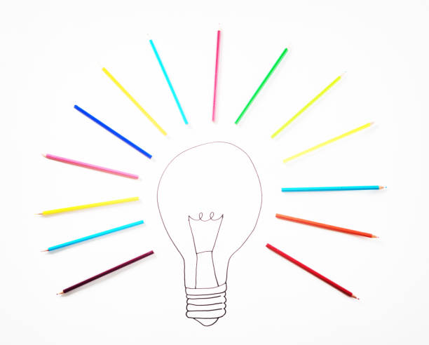 istock Hand-drawn light bulb surrounded by real colored pencils 1168157605