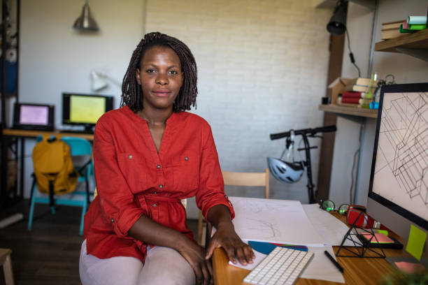 istock Attractive African female graphic designer in the office 1168161127