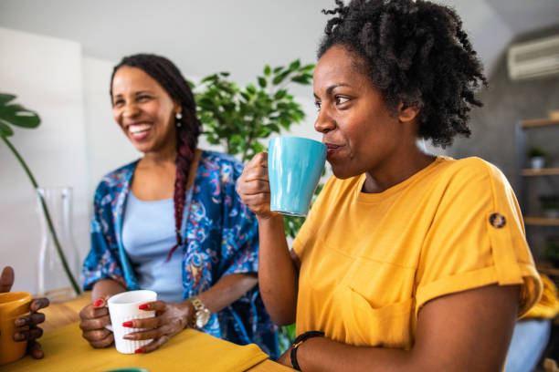 istock Catching up on the office gossip 1168161539