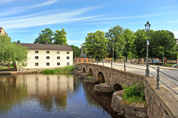 istock Old bridge by the river in Orebro, Sweden 1168162510