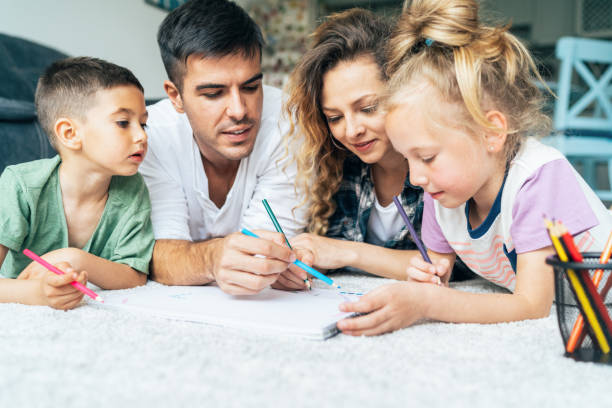 istock Young family drawing 1168164558