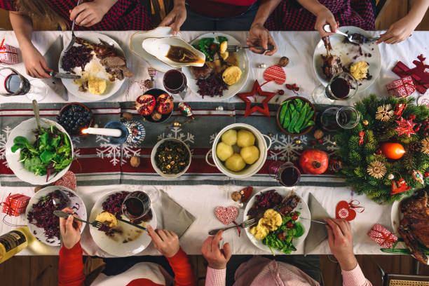 istock family dining at christmas table 1168165364