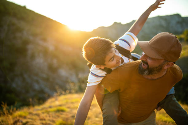 istock I'm tired dad, carry me on your  back 1168166509