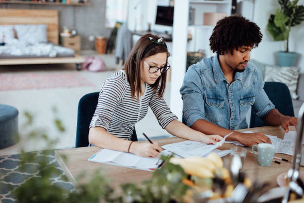 istock Couple managing the debt 1168166572