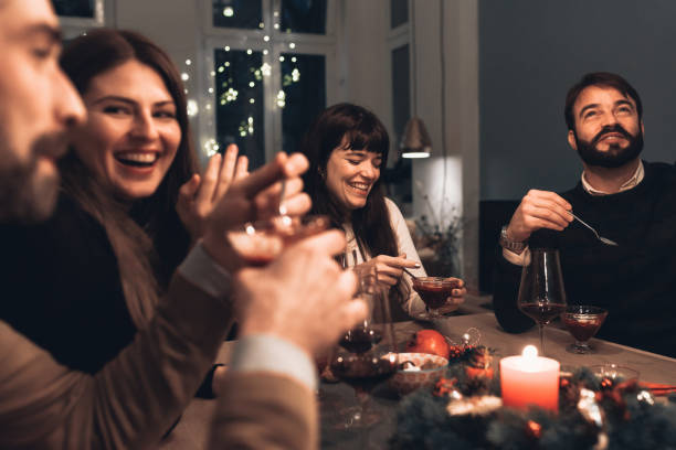 istock friends at christmas table 1168167108
