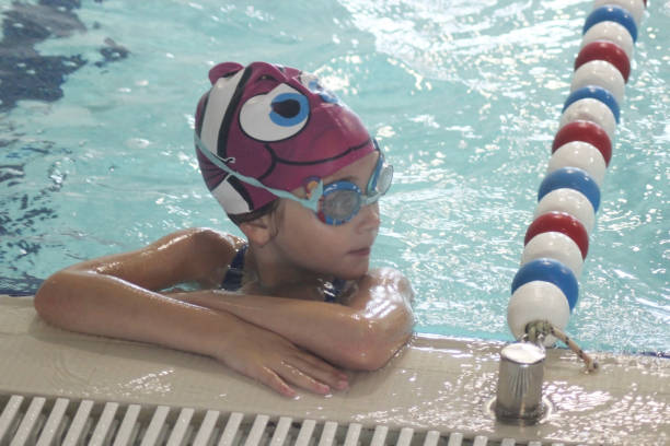 istock Little girl learning to swim 1168169755