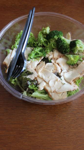 istock Roasted chicken breast salad - lunch at office 1168170040