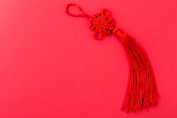 istock Chinese lucky knot on red background 1168170934