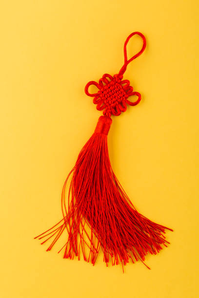 istock Chinese lucky knot on yellow background 1168171097