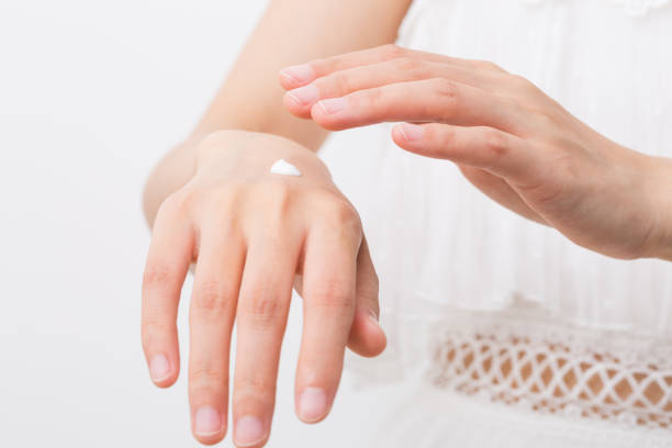 istock Female applying cream to her hands 1168171926