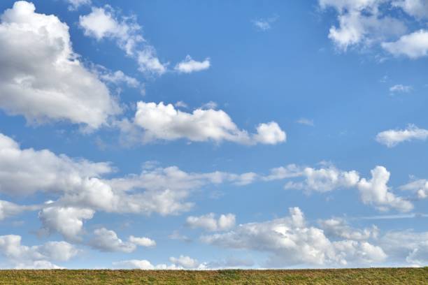 istock Blue sky and white cumulus clouds. Landscape background in summer. 1168176749