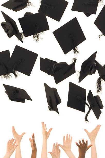 istock Graduation day throwing caps in the air (XXL) 116818211