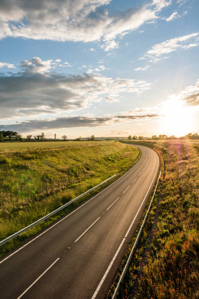istock uk motorway road overhead view at daylight 1168182867