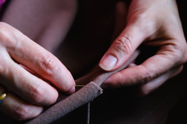 istock Woman tailoring close-up 1168184419