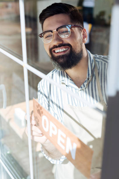 istock Positive happy man looking into the window 1168184601