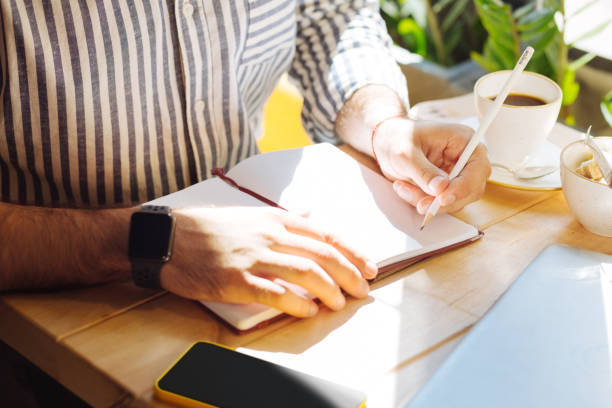 istock Top view of a notebook lying on the table 1168184961