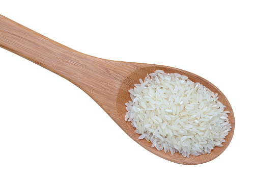a spoon of rice isolated on white background