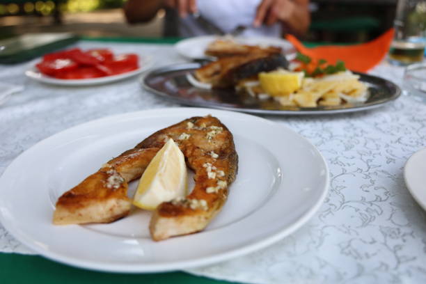 istock Grilled fish with potato salad 1168191075