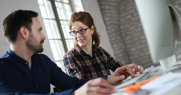 istock Portrait of young designers working on computer 1168194846