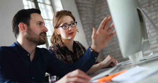 istock Portrait of young designers working on computer 1168194874