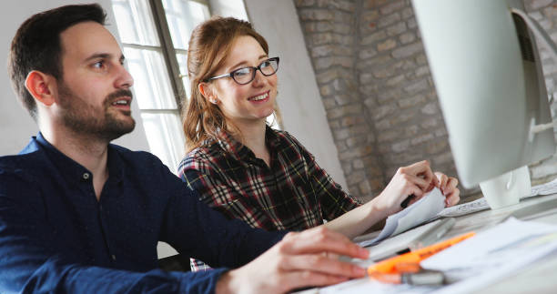 istock Portrait of young designers working on computer 1168194912