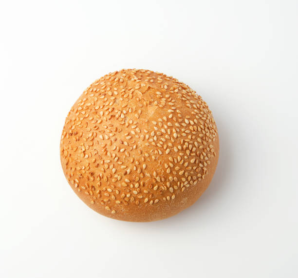 istock baked whole round bun with sesame seeds made from white wheat flour 1168196072