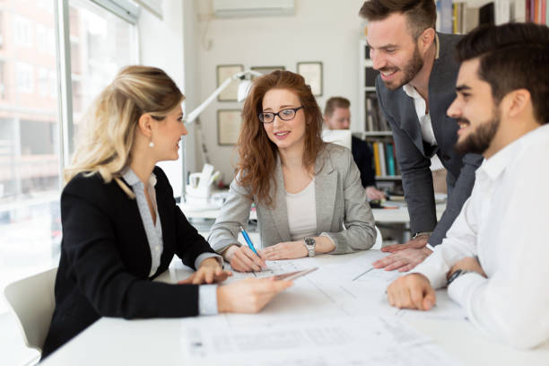 istock Team of architects working together on project 1168197242