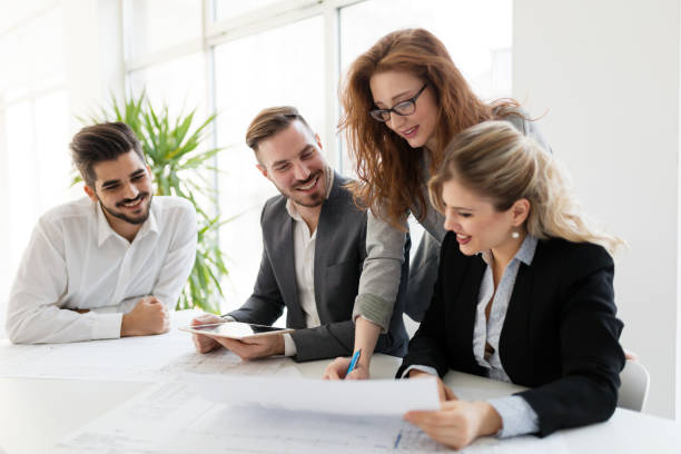 istock Team of architects working together on project 1168197259