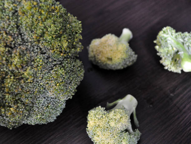 istock fresh cauliflower and broccoli on a dark background 1168198020